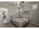 Bedroom with ceiling fan and neutral colors at 19323 E Canary Way, Queen Creek, AZ 85142