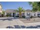Charming single-story home featuring a well-maintained front yard and a spacious driveway at 19323 E Canary Way, Queen Creek, AZ 85142