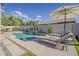 Backyard pool featuring desert landscaping, lounge chairs, and tanning deck at 19323 E Canary Way, Queen Creek, AZ 85142