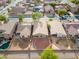 An aerial view showcases the well-maintained home, neat backyard and neighborhood at 21533 N Greenway Rd, Maricopa, AZ 85138