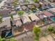 An aerial view of the neighborhood showcasing several homes at 21533 N Greenway Rd, Maricopa, AZ 85138