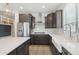 Well-lit kitchen with stainless steel appliances, white countertops, and subway tile backsplash at 22023 N 28Th Pl, Phoenix, AZ 85050