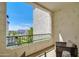Relaxing balcony with comfortable seating and a picturesque neighborhood view on a sunny day at 2511 W Queen Creek Rd # 374, Chandler, AZ 85248