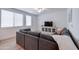 Bright living room with large windows, ceiling fan and a comfortable sectional sofa at 2511 W Queen Creek Rd # 374, Chandler, AZ 85248