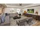 This welcoming living room has comfortable seating and a large flat-screen television at 2511 W Queen Creek Rd # 374, Chandler, AZ 85248