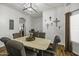 Dining room featuring a decorative light fixture, table, and chairs at 2751 N Ralston Rd, Maricopa, AZ 85139