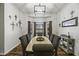 Dining room features a decorative light fixture, and large bay window overlooking the backyard at 2751 N Ralston Rd, Maricopa, AZ 85139