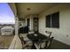 This covered patio has a dining table and chairs, creating a perfect outdoor dining area at 2751 N Ralston Rd, Maricopa, AZ 85139