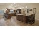Well-equipped kitchen with a large central island, granite counters, and stainless steel appliances at 2917 E Northridge St, Mesa, AZ 85213