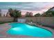 Tranquil backyard oasis with a sparkling in-ground pool at 2917 E Northridge St, Mesa, AZ 85213