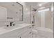 Modern bathroom showcasing a black framed mirror and dark hardware at 2926 E Corrine Dr, Phoenix, AZ 85032