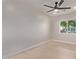 Bright bedroom with a ceiling fan, recessed lighting, and a window view at 2926 E Corrine Dr, Phoenix, AZ 85032