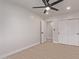 This is a spacious bedroom with a modern ceiling fan and wood floors at 2926 E Corrine Dr, Phoenix, AZ 85032