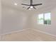 A bright bedroom that features a ceiling fan, recessed lights, and a window at 2926 E Corrine Dr, Phoenix, AZ 85032