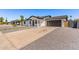 Updated home with a contemporary design, low maintenance landscaping, and a paved driveway at 2926 E Corrine Dr, Phoenix, AZ 85032
