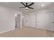 Clean bedroom with wood floors, ceiling fan and ample closet space at 2926 E Corrine Dr, Phoenix, AZ 85032