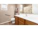 Well-lit bathroom featuring modern fixtures and a spacious vanity at 2945 E Clifton Ave, Gilbert, AZ 85295
