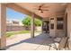 Relaxing covered patio with ceiling fan and view of the backyard at 2945 E Clifton Ave, Gilbert, AZ 85295