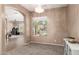 Charming dining room showcases archway, neutral paint, a stylish light fixture, and a large window at 2945 E Clifton Ave, Gilbert, AZ 85295