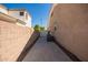 Property exterior showing side yard, wall, and an external storage unit at 2945 E Clifton Ave, Gilbert, AZ 85295