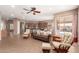 Open-concept living space featuring tile flooring, abundant natural light, and easy access to kitchen at 2945 E Clifton Ave, Gilbert, AZ 85295