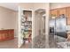 Walk-in pantry provides ample storage space and stainless steel refrigerator in kitchen at 2945 E Clifton Ave, Gilbert, AZ 85295