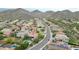 Community aerial view of a neighborhood with lush greenery and mountain views at 29506 N 21St Ave, Phoenix, AZ 85085