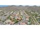 An aerial view of a community nestled in the mountains, with a highlighted property at 29506 N 21St Ave, Phoenix, AZ 85085
