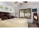 Inviting bedroom featuring wood shutters, plush bedding, and neutral decor at 29506 N 21St Ave, Phoenix, AZ 85085
