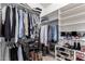 A walk-in closet with shelving and rods for storage at 29506 N 21St Ave, Phoenix, AZ 85085