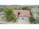 Charming single-story home featuring a well-manicured front yard and a two-car garage at 29506 N 21St Ave, Phoenix, AZ 85085