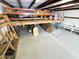 Bright workshop features metal beams, high ceilings, and plenty of storage space, and an upper level at 3215 W Orangewood Ave, Phoenix, AZ 85051