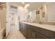 Bathroom with double sinks, granite counters, and modern fixtures at 3283 E Outlaw Ln, San Tan Valley, AZ 85140