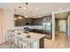 Stylish kitchen featuring stainless steel appliances, a large island, and ample counter space at 3283 E Outlaw Ln, San Tan Valley, AZ 85140