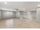 Upstairs loft area with abundant light featuring tile flooring and a cozy atmosphere at 3491 N 301St Dr, Buckeye, AZ 85396