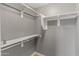 Open closet with ample shelving and storage, perfect for organizing clothes and accessories at 3491 N 301St Dr, Buckeye, AZ 85396