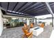 Inviting backyard featuring an outdoor kitchen, pergola, firepit and lounge seating at 3502 N Rose Circle Dr, Scottsdale, AZ 85251