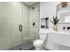 Clean bathroom featuring a glass shower, modern fixtures, and a stylish vanity area at 3502 N Rose Circle Dr, Scottsdale, AZ 85251