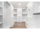 Spacious walk-in closet with custom shelving and drawers, offering ample storage at 3502 N Rose Circle Dr, Scottsdale, AZ 85251