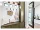 Welcoming entryway with built-in bench seating, storage, and a modern glass door at 3502 N Rose Circle Dr, Scottsdale, AZ 85251