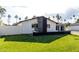Modern single-story home with manicured lawn and decorative privacy wall, offering curb appeal at 3502 N Rose Circle Dr, Scottsdale, AZ 85251