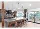 Modern kitchen featuring a large island, sleek countertops, and stainless steel appliances at 3502 N Rose Circle Dr, Scottsdale, AZ 85251