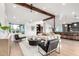 The spacious living room has hardwood floors, high ceilings, and lots of natural light at 3502 N Rose Circle Dr, Scottsdale, AZ 85251