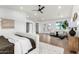 This bedroom has a sitting area, natural light, and wood flooring at 3502 N Rose Circle Dr, Scottsdale, AZ 85251