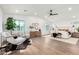This bedroom has a sitting area, natural light, and wood flooring at 3502 N Rose Circle Dr, Scottsdale, AZ 85251