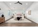 This spacious bedroom features neutral colors, wood floors, and recessed lighting at 3502 N Rose Circle Dr, Scottsdale, AZ 85251