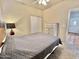 Cozy bedroom featuring a comfortable bed, dresser, and closet at 36721 N 17Th Ave, Phoenix, AZ 85086