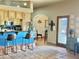 Kitchen with light wood cabinets, Saltillo tile floors and a large arched doorway at 36721 N 17Th Ave, Phoenix, AZ 85086