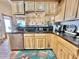 Charming kitchen with light wood cabinets, stainless steel appliances, and a view to the next room at 36721 N 17Th Ave, Phoenix, AZ 85086