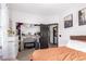 Bright bedroom with an open closet, dresser, and access to ensuite bathroom for added convenience at 4243 E Jasper Dr, Gilbert, AZ 85296
